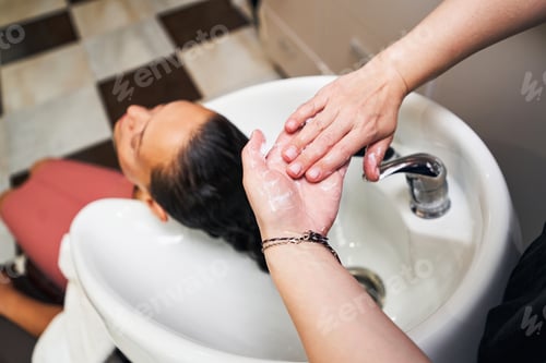 Preview: Competent hairdresser testing new balm in work