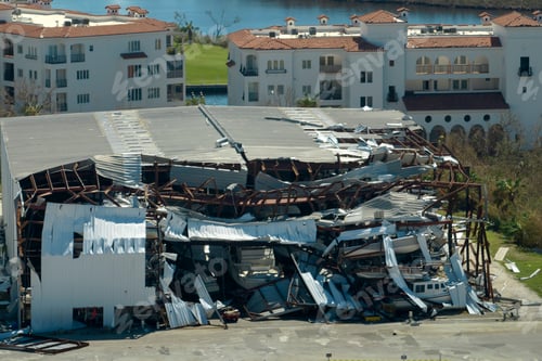 Preview: Boat station destroyed by hurricane wind in Florida coastal area. Consequences of natural disaster