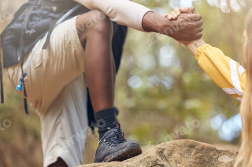 Preview: Hands of support and help for hiking couple walking, travel or trekking on rock in countryside natu