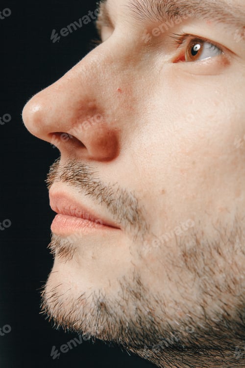Preview: Handsome And Positive Guy In A Black Shirt On A Black Background