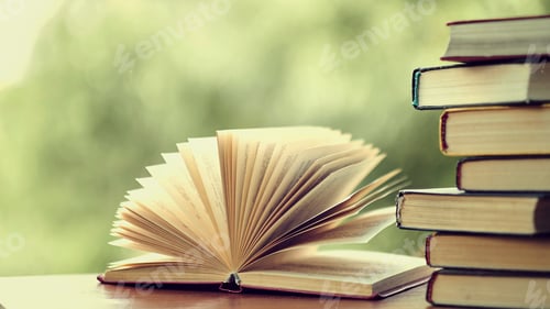 Preview: pile of old books lie on the table. home library. concept of vacation from gadgets in nature