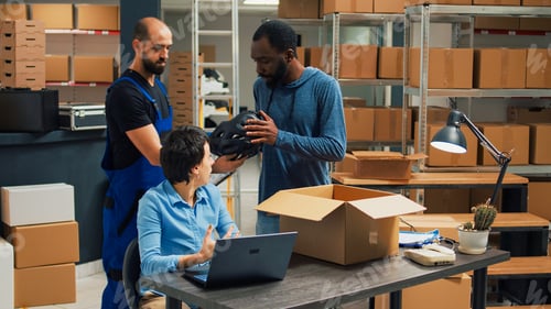 Preview: Team of employees working on shipping merchandise to clients
