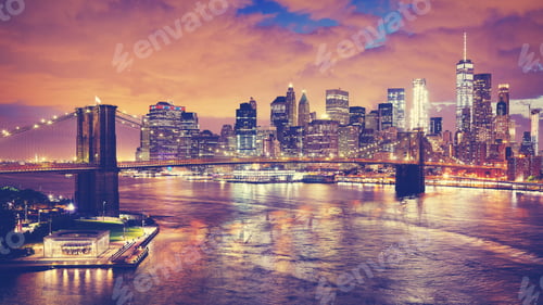Preview: Color toned panoramic pictue of New York at night.
