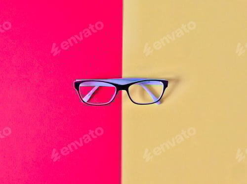 Preview: Eyeglasses on Graphic Red and Yellow Background
