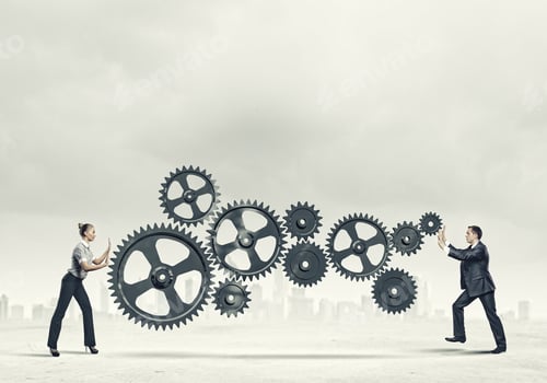 Preview: Businessman And Businesswoman With Cog Wheel Elements. Organization Concept