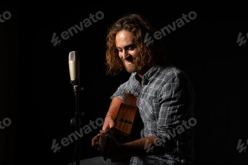Preview: Caucasian musician playing guitar in Spain