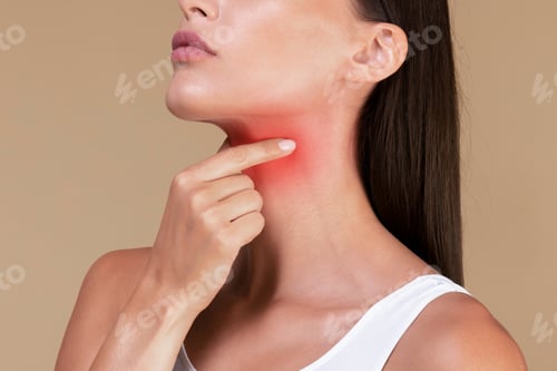 Preview: Closeup of unrecognizable sick lady suffering from sore throat, touching neck with hand, inflamed