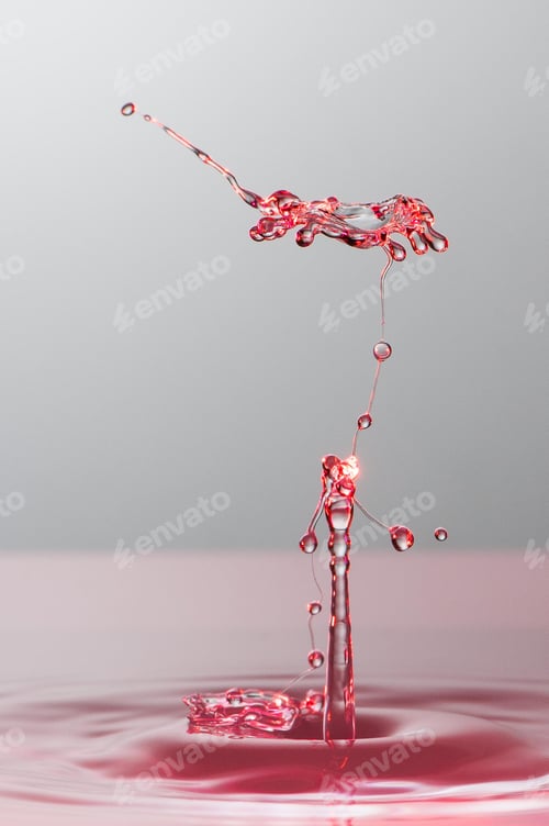 Preview: Splash of colorful liquid with high speed flash