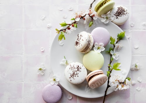 Elegant Macarons on Plate with Spring Blossoms