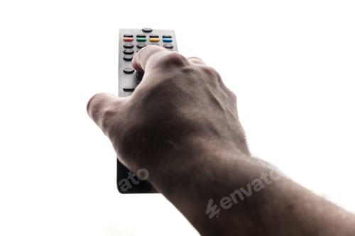 Preview: Hand holding tv remote isolated on white background.