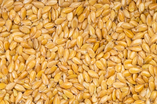 Preview: background - many golden flax seeds