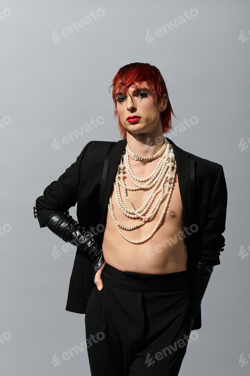 Preview: A confident young man with edgy style exudes charisma against a minimalist backdrop.