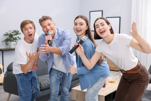 Preview: Group of friends singing karaoke at home