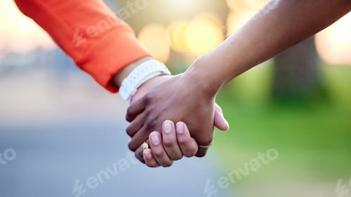 Preview: Interracial couple, holding hands and love in nature for support, trust or unity together. Closeup