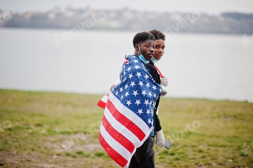 Preview: African teenagers friends with USA flag
