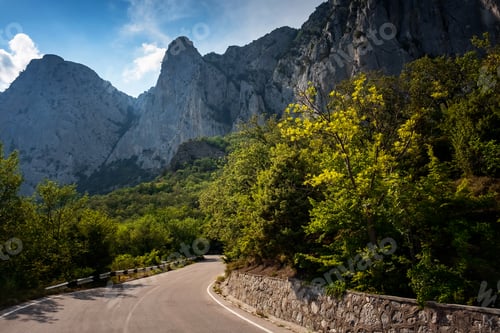 Preview: asphalted road in the mountains, beautiful sunshine, summer vacation time