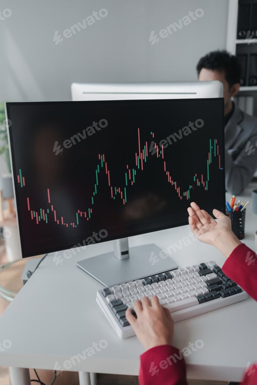 Preview: Asian woman looking at stock market graph screen, stock market businessman analyzing stock market ri