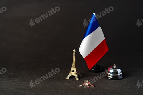 Preview: France flag on the reception desk in the hotel lobby