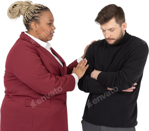 Preview: a man and a woman standing next to each other with their arms crossed