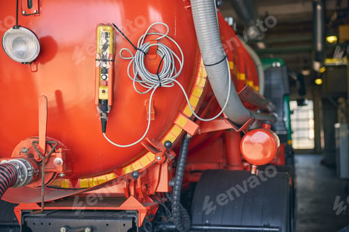 Preview: Close up of orange tank with water inside
