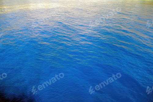 Preview: Rippled empty sea background texture, close up view. Wavy blue ocean water, ad template, copy space