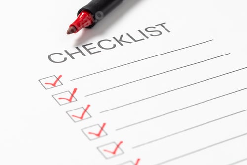 Preview: Blank white checklist with a red marker pen