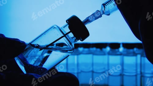 Preview: Vaccine bottles and syringe injection. Medicine in ampoules.