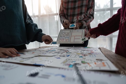 Preview: Creative designer choosing color samples for mobile responsive website development with UI UX