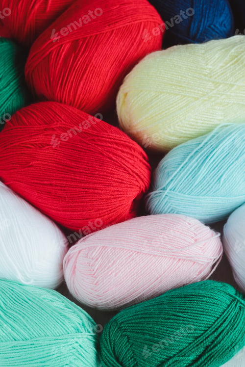Preview: colorful oval acrylic colorful wool yarn thread skeins background