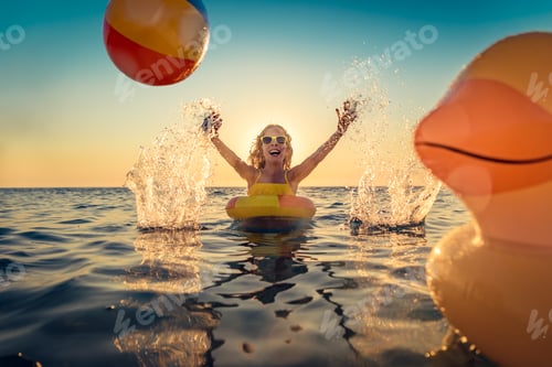 Preview: Happy child having fun on summer vacation
