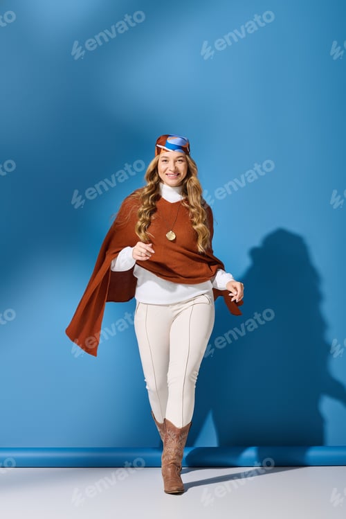 Preview: A young plus size woman confidently walks in a stylish outfit against a vibrant blue backdrop