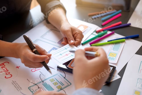 Preview: Teamwork process, Graphic designer creative planning work together on website ux ui app development.