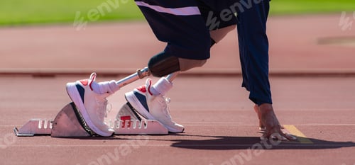 Preview: Disabled athletes prepare in starting position ready to run on stadium track