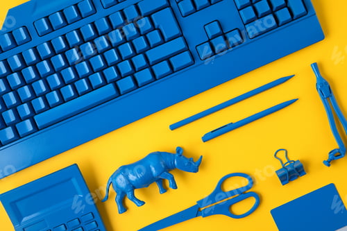 Preview: Office suplies painted in classic blue color over yelow background. Study, education, creative