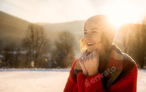 Preview: Happy girl in winter clothes portrait snowy outdoor during sunny day