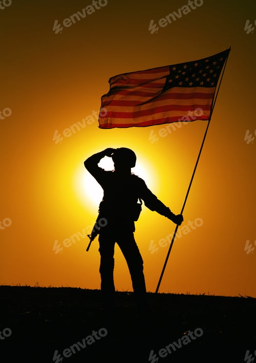 Preview: US soldier with flag looking far away at sunset