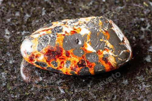 Preview: polished franklinite and zincite minerals on black