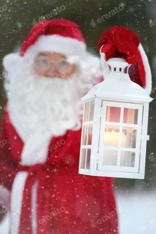 Preview: Santa Claus with bag of Christmas gifts and lantern