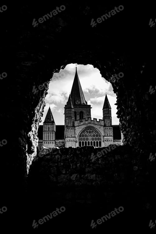 Preview: Vertical of Southwell Cathedral seen through a cave in England in grayscale