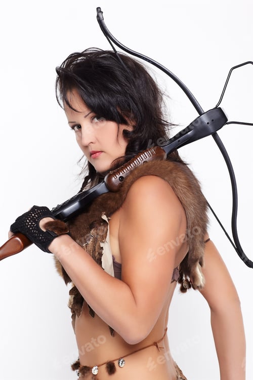 Preview: Portrait Of Beautiful Woman Fur Hunter With Crossbow On Gray