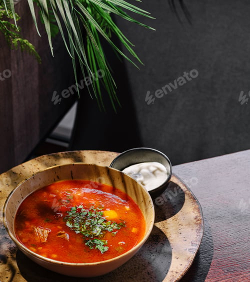 Preview: Delicious soup served in a rustic bowl at a cozy cafe during lunch time