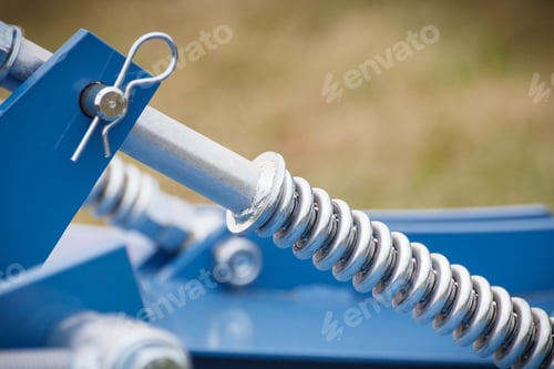 Preview: Hard spring made of steel. Part and detail of industrial or agricultural machine