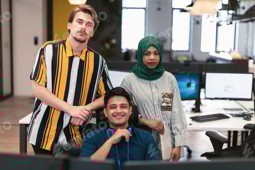 Preview: Multiethnic startup business team woman wearing a hijab on meeting in modern open plan office