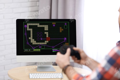 Preview: Young man playing video game at home, closeup