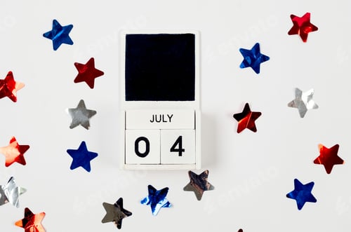 Preview: red, white and blue star-shaped confetti on white background