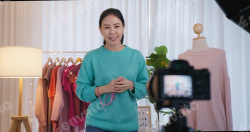 Preview: Asia SME owner or seller woman micro influencer record live talk video camera at home studio
