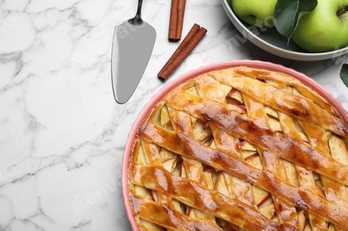 Preview: Flat lay composition with fresh traditional apple pie on white marble table. Space for text