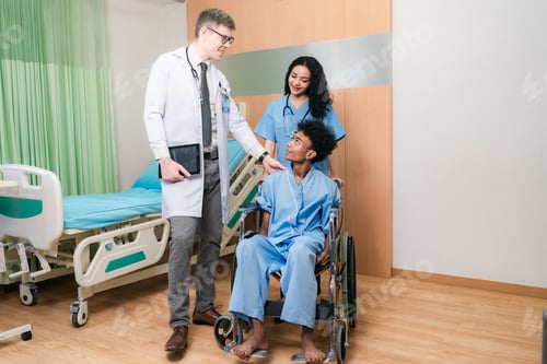 Preview: young Asian male doctor and female nurse in lab coat with stethoscope in conversation