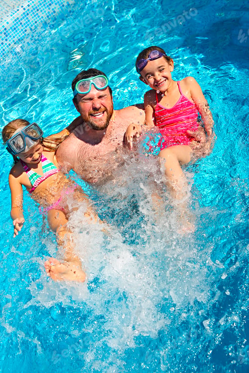 Preview: Young dad and little daughter splaying in swimming pool enjoying summer vacation