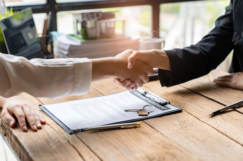 Preview: real estate agents shaking hands with customers after accepting an agreement to finish buying or ren
